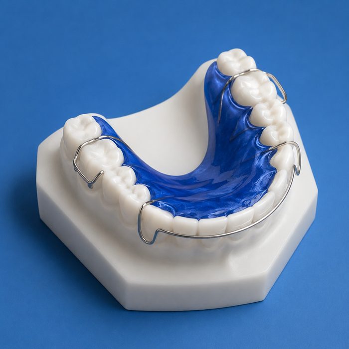 Hawley retainer with acrylic base and front wire